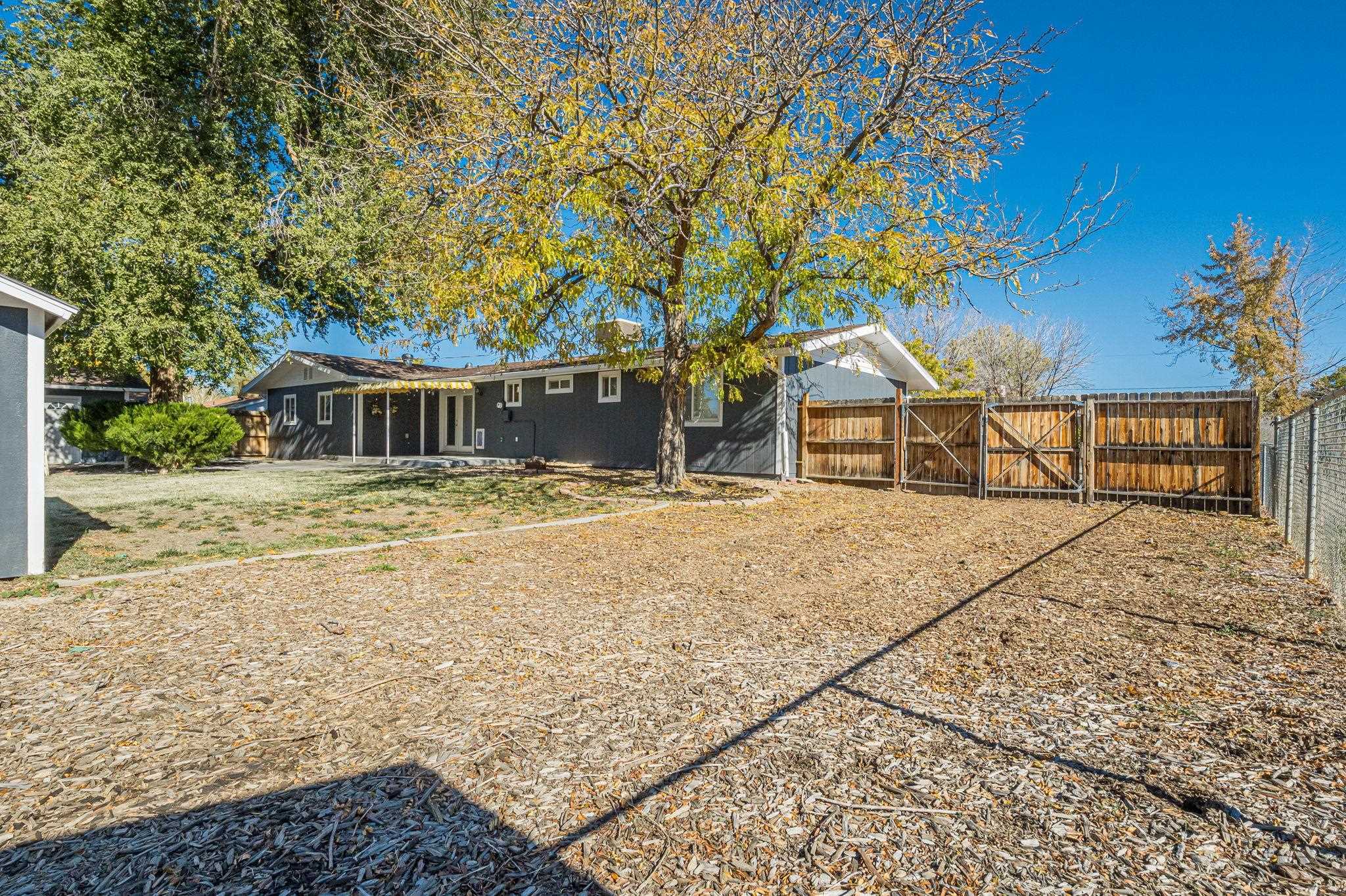 585-29 29 3/8 Road Grand Junction, CO 81504 - Photo 37 of 42 a house with trees in front of it