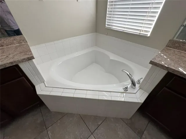 a bathroom with a bathtub