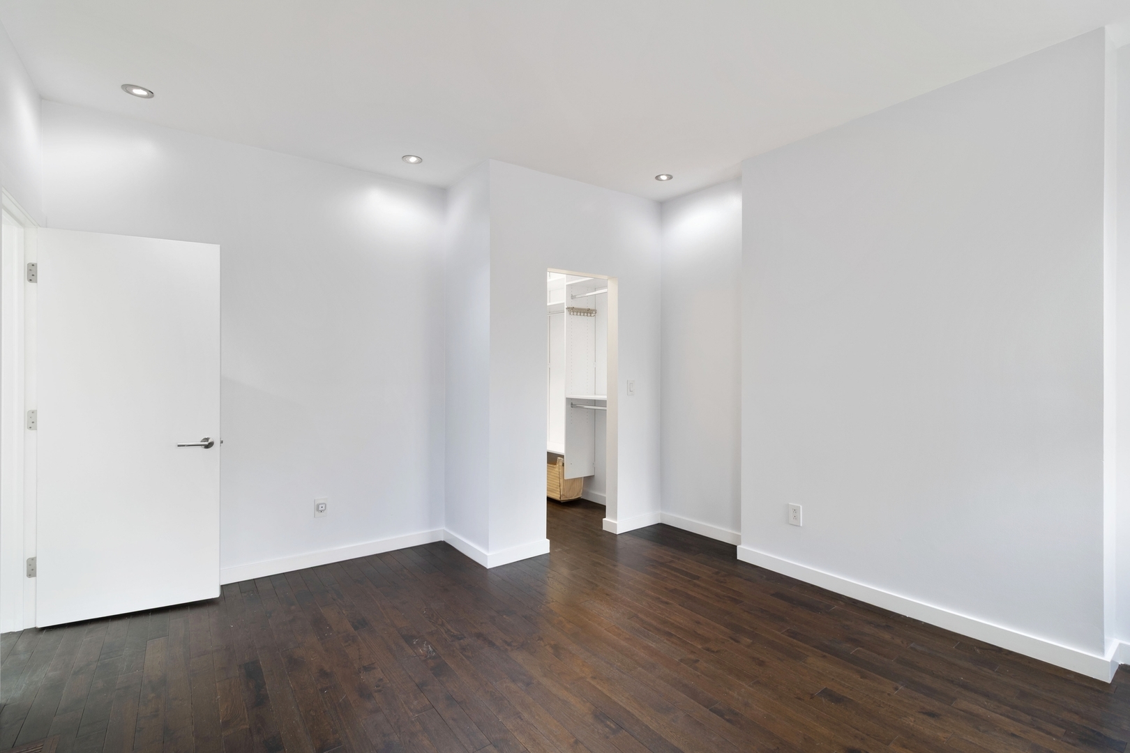 Undisclosed Address Chicago, IL 60607 - Photo 11 of 17 a view of an empty room with wooden floor and closet