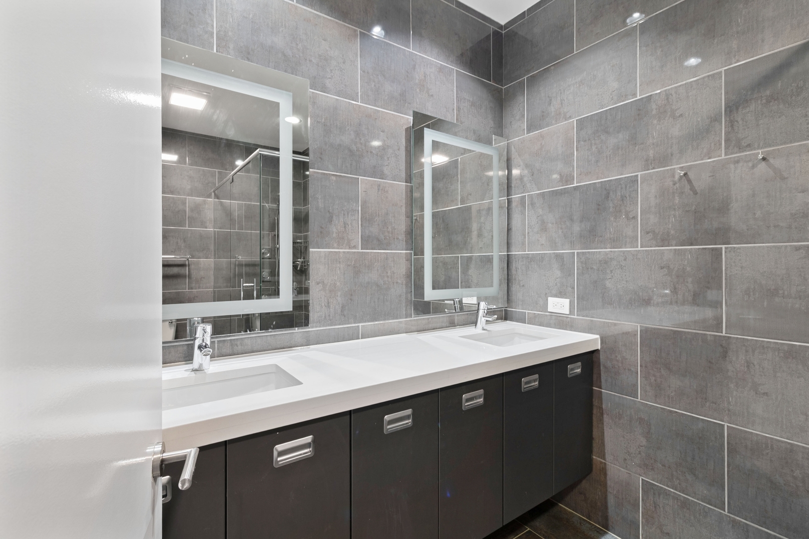 Undisclosed Address Chicago, IL 60607 - Photo 12 of 17 a bathroom with a sink and a mirror