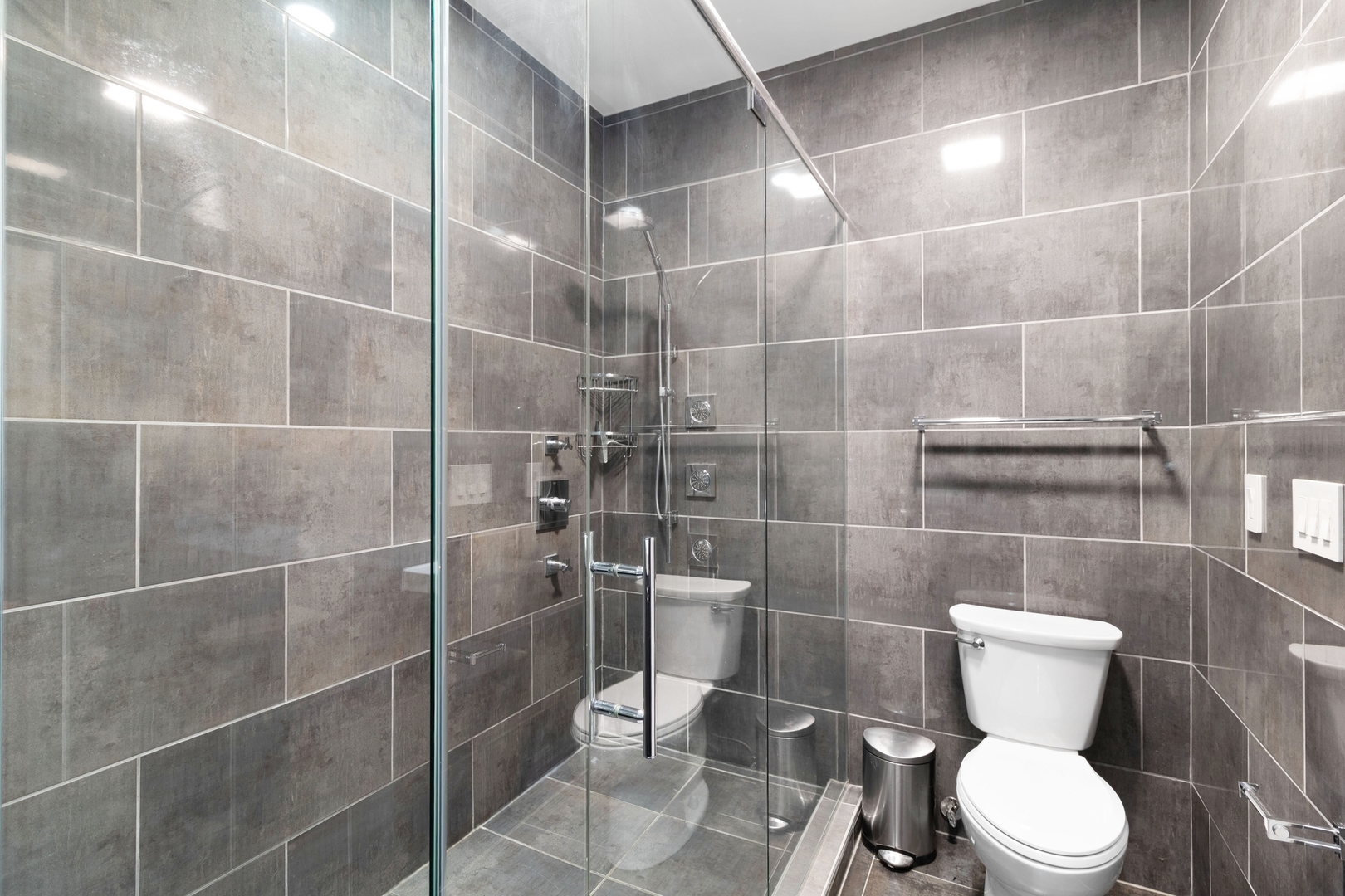 Undisclosed Address Chicago, IL 60607 - Photo 13 of 17 a bathroom with a toilet and a sink