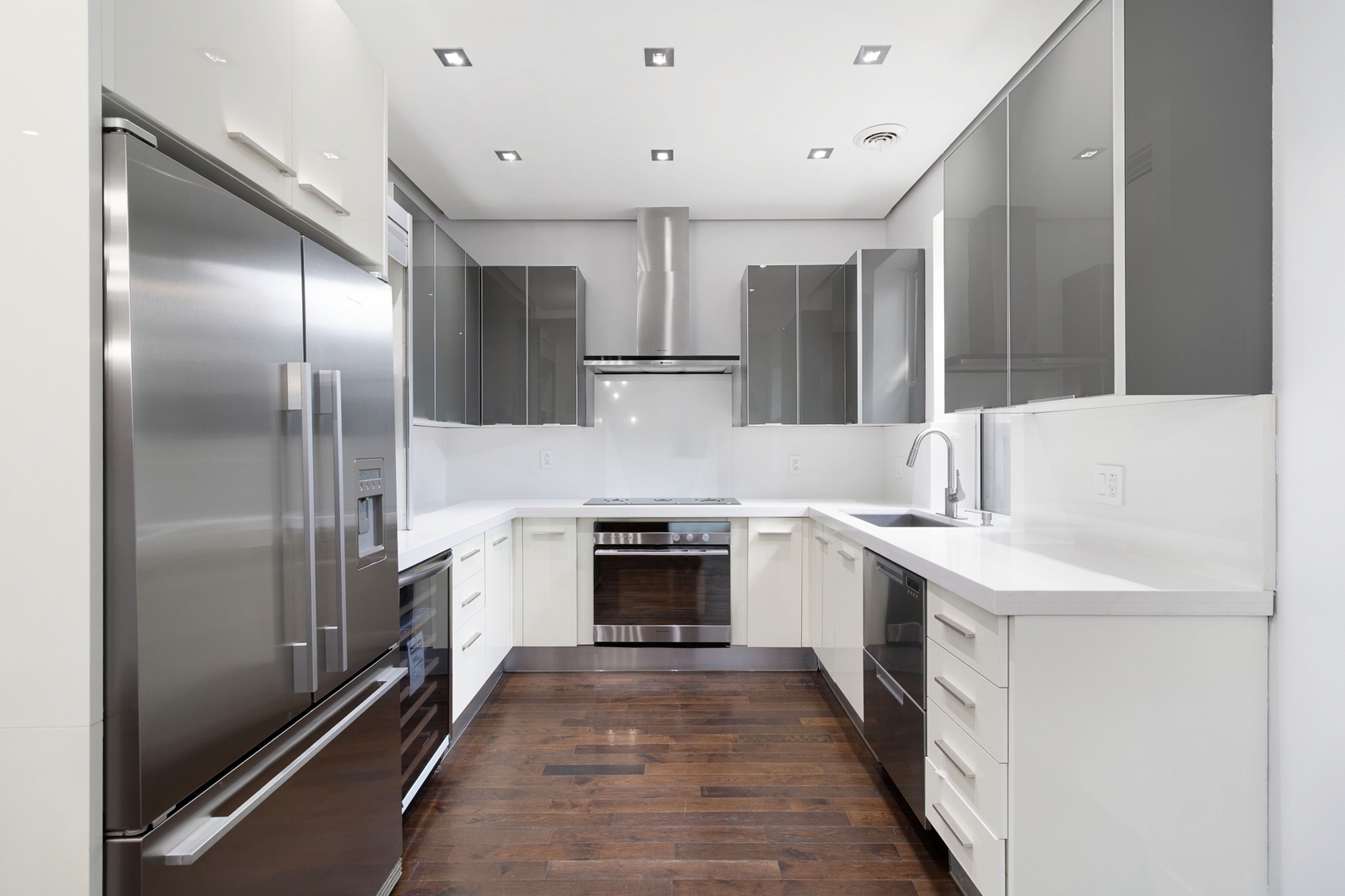Undisclosed Address Chicago, IL 60607 - Photo 7 of 17 a kitchen with stainless steel appliances granite countertop a refrigerator and a stove top oven