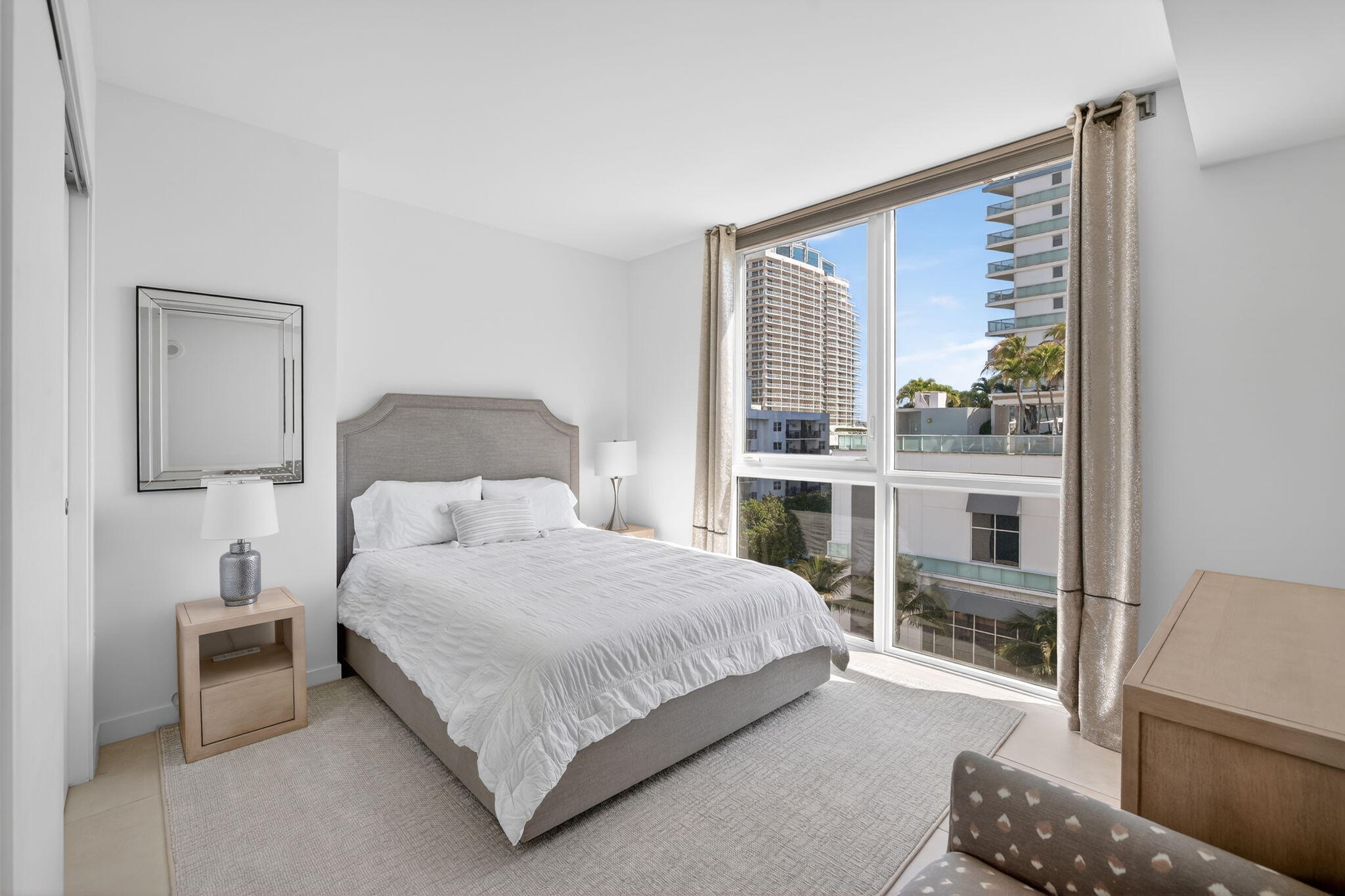 401 North Birch Road, Unit 600 Fort Lauderdale, FL 33304 - Photo 23 of 47 a bedroom with a large bed and a couch