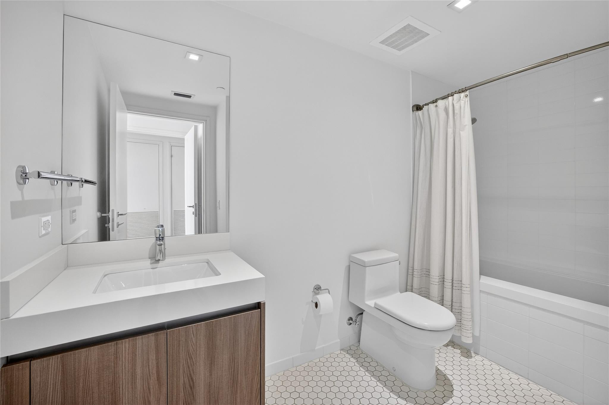 401 North Birch Road, Unit 600 Fort Lauderdale, FL 33304 - Photo 25 of 47 a bathroom with a sink a toilet and shower