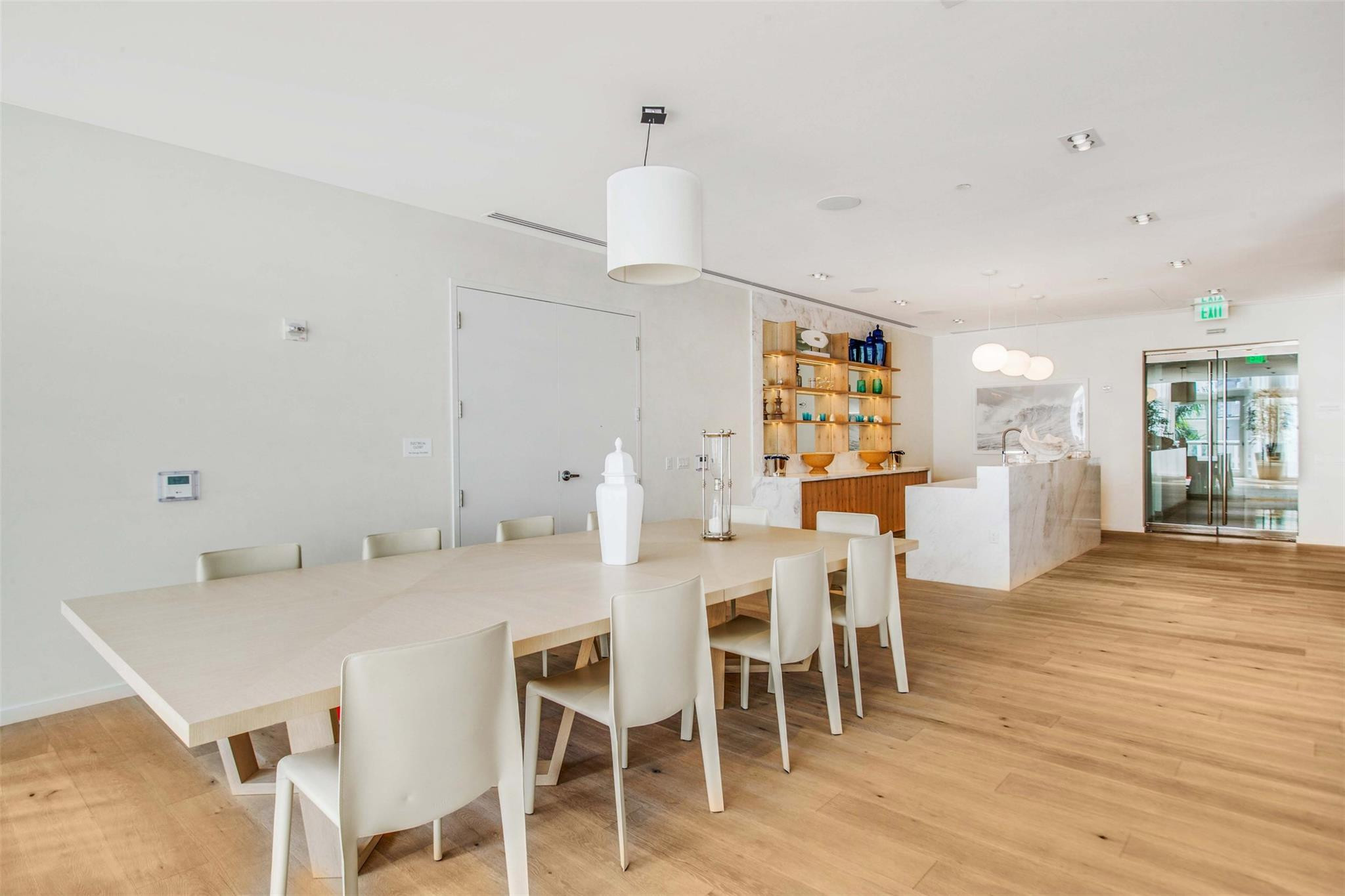 401 North Birch Road, Unit 600 Fort Lauderdale, FL 33304 - Photo 35 of 47 a dining room with furniture and wooden floor