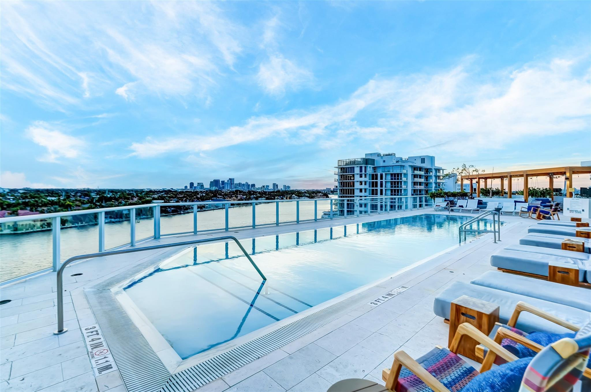 401 North Birch Road, Unit 600 Fort Lauderdale, FL 33304 - Photo 38 of 47 a view of a swimming pool with a lounge chair