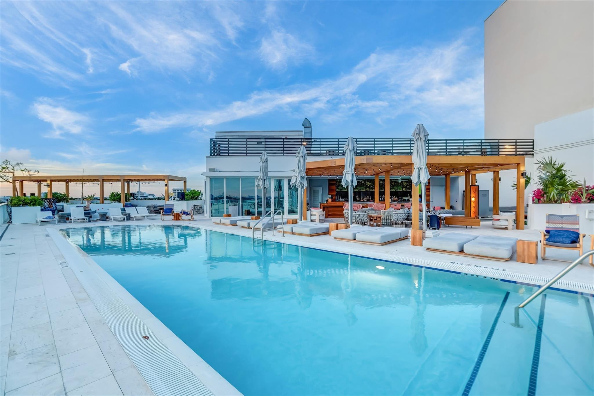401 North Birch Road, Unit 600 Fort Lauderdale, FL 33304 - Photo 39 of 47 a view of a swimming pool with a patio