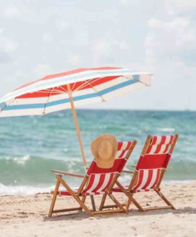 401 North Birch Road, Unit 600 Fort Lauderdale, FL 33304 - Photo 44 of 47 a backyard of a house with table and chairs