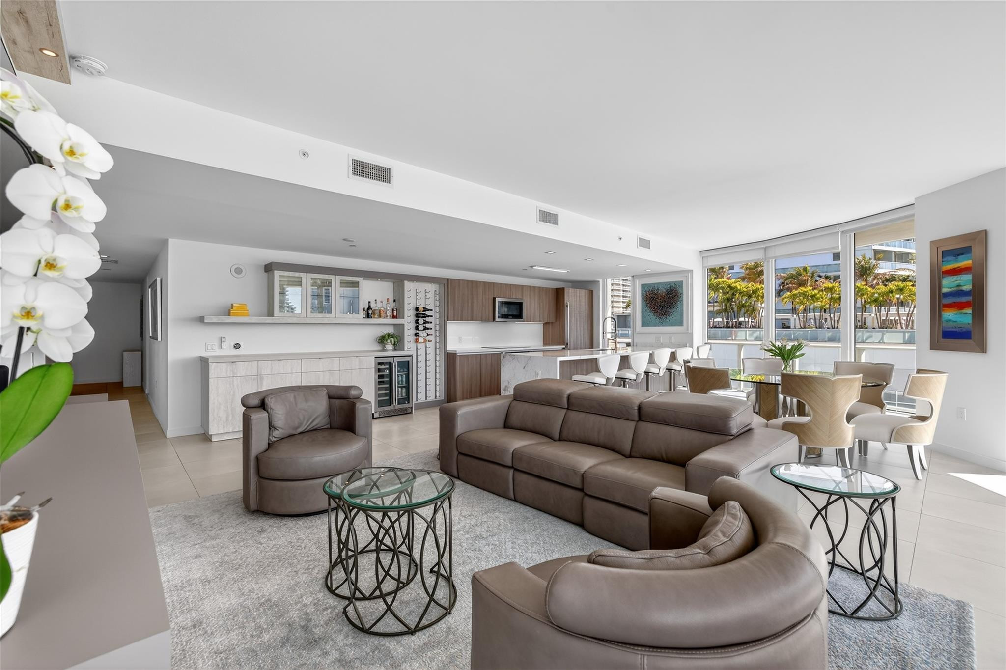 401 North Birch Road, Unit 600 Fort Lauderdale, FL 33304 - Photo 5 of 47 a living room with furniture and a fireplace