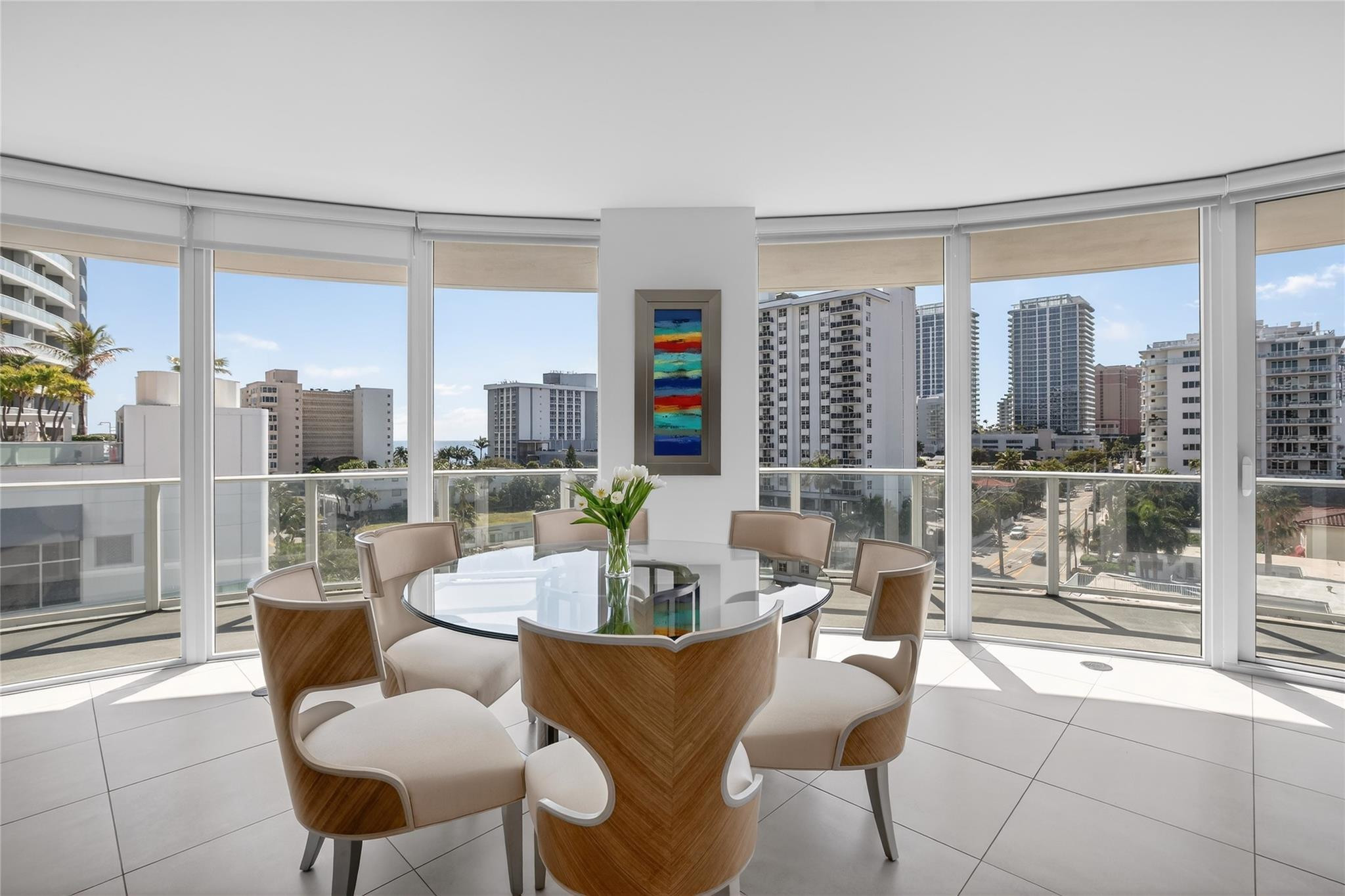 401 North Birch Road, Unit 600 Fort Lauderdale, FL 33304 - Photo 6 of 47 a dining room with furniture and a floor to ceiling window
