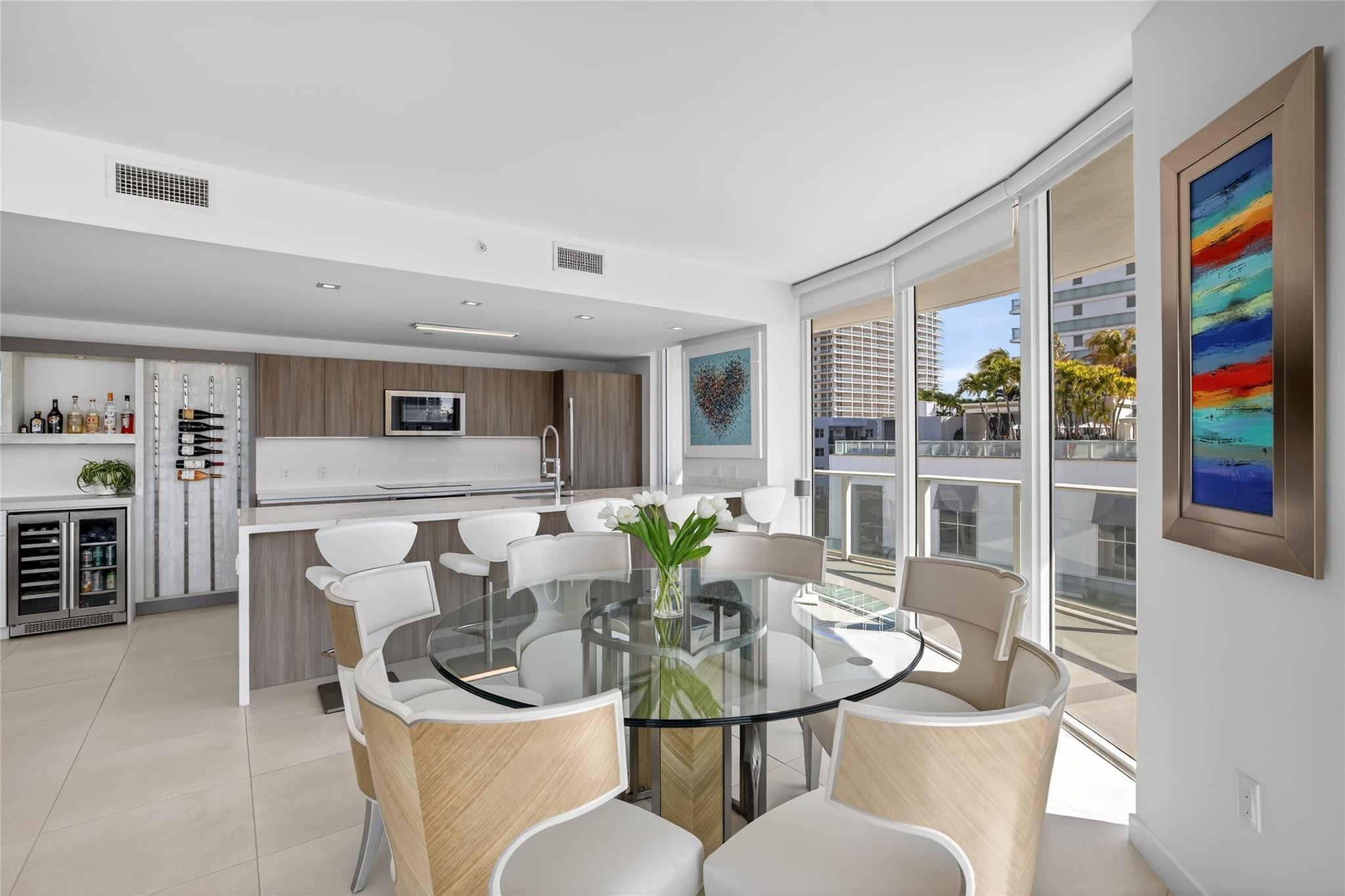 401 North Birch Road, Unit 600 Fort Lauderdale, FL 33304 - Photo 7 of 47 a view of a dining room with furniture window and outside view