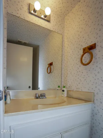 a bathroom with a tub and a shower
