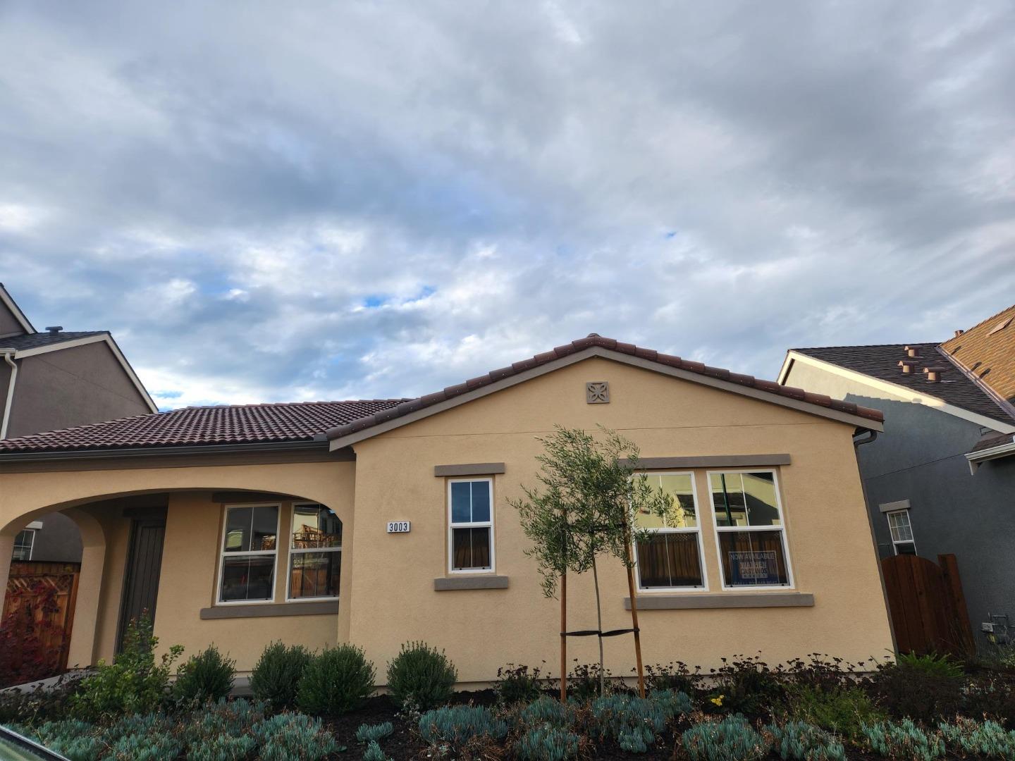 a front view of a house with windows
