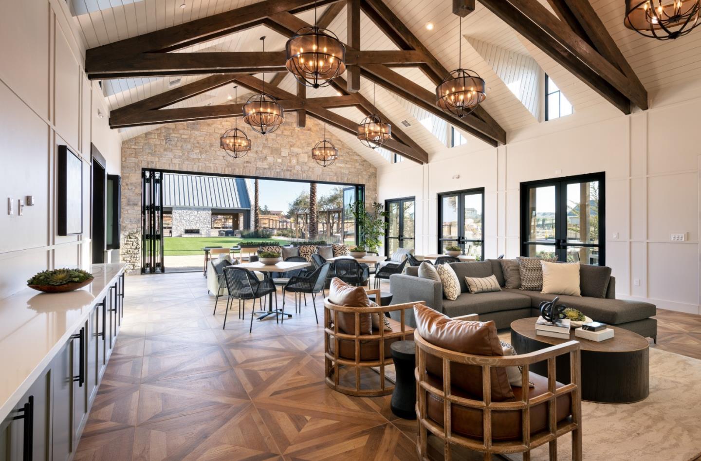 3003 Shasta Way Marina, CA 93933 - Photo 11 of 15 a living room with couches a large dining table and chairs with wooden floor