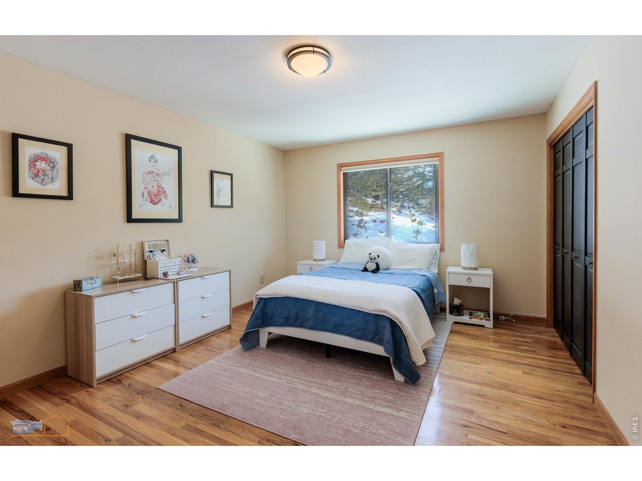 84 Canon View Road Boulder, CO 80302 - Photo 21 of 33 a bedroom with a bed and a desk