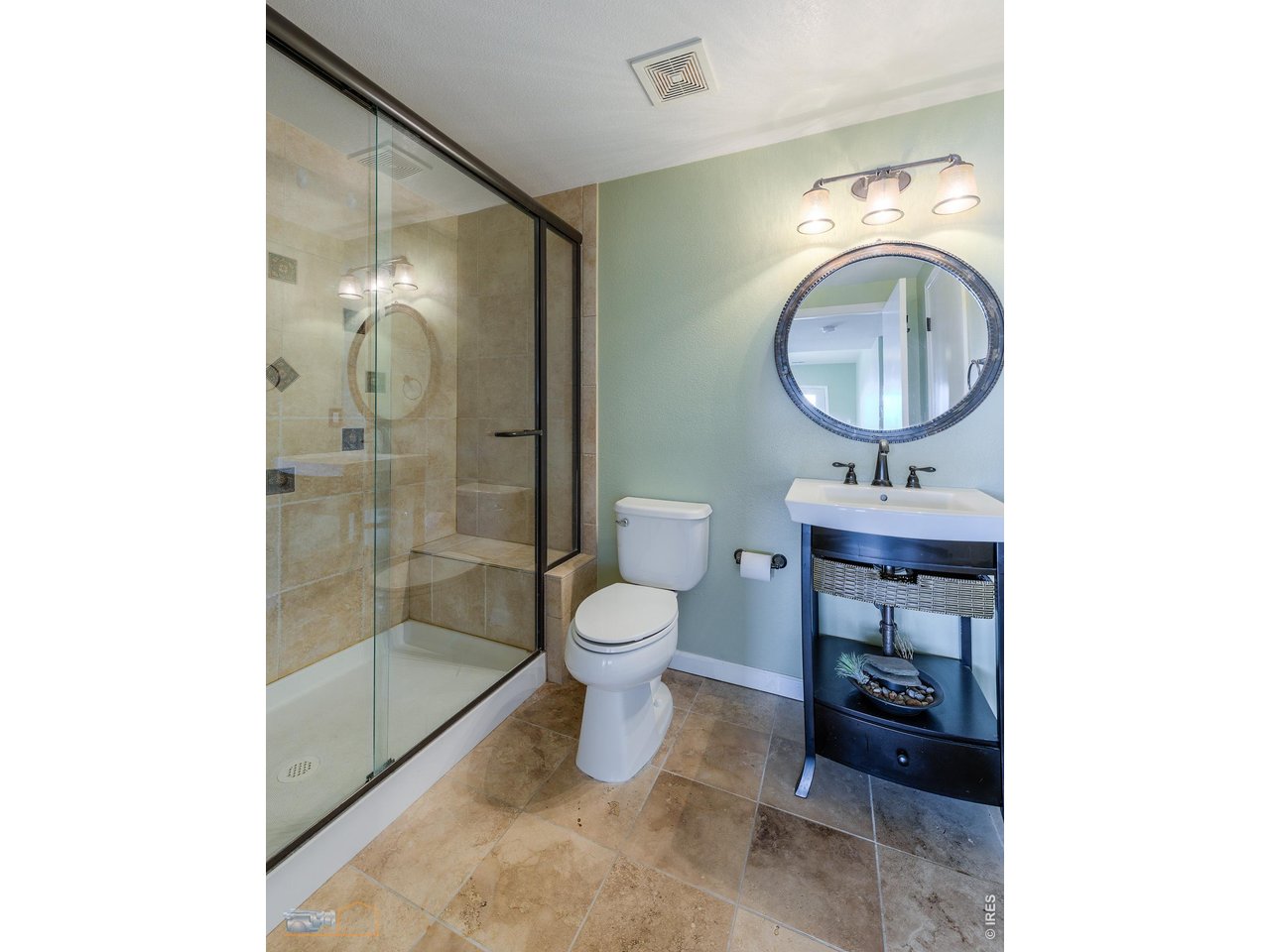 84 Canon View Road Boulder, CO 80302 - Photo 26 of 33 a bathroom with a toilet a sink and a mirror