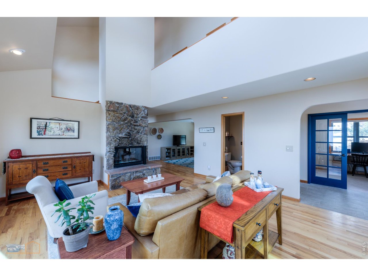 84 Canon View Road Boulder, CO 80302 - Photo 6 of 33 a living room with furniture and wooden floor