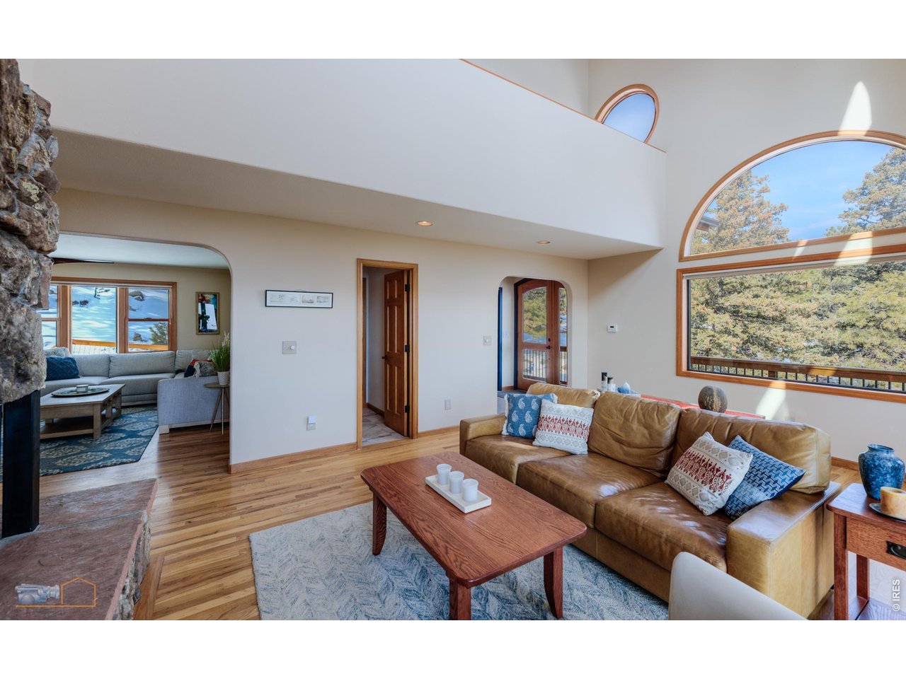 84 Canon View Road Boulder, CO 80302 - Photo 8 of 33 a living room with furniture and a large window