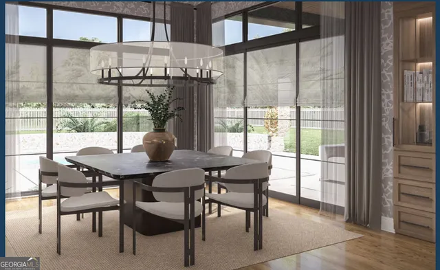 a view of a dining room with furniture window and outside view