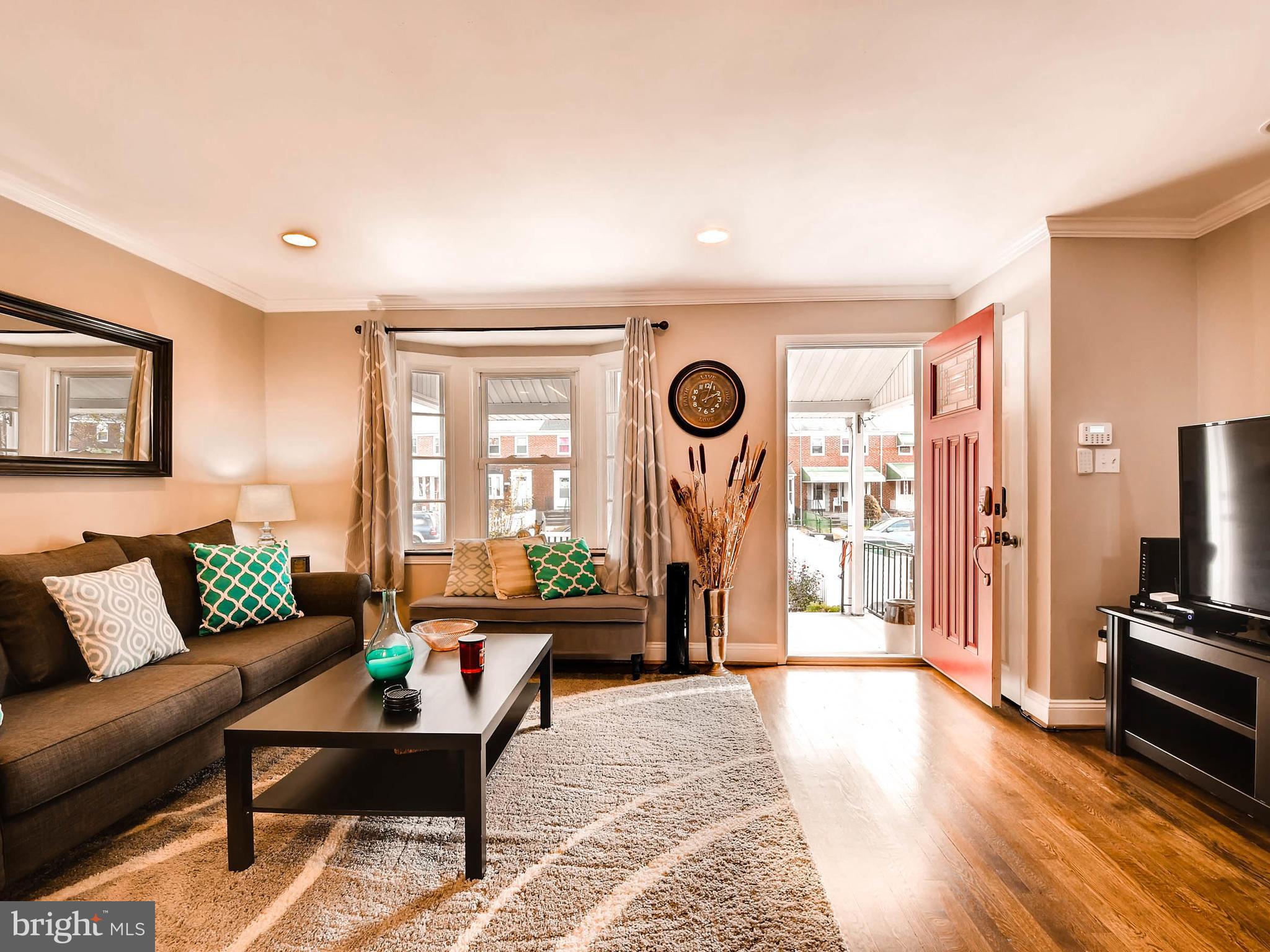 1914 Barry Road Baltimore, MD 21222 - Photo 2 of 28 Living Room with Gorgeous Hardwood Floors