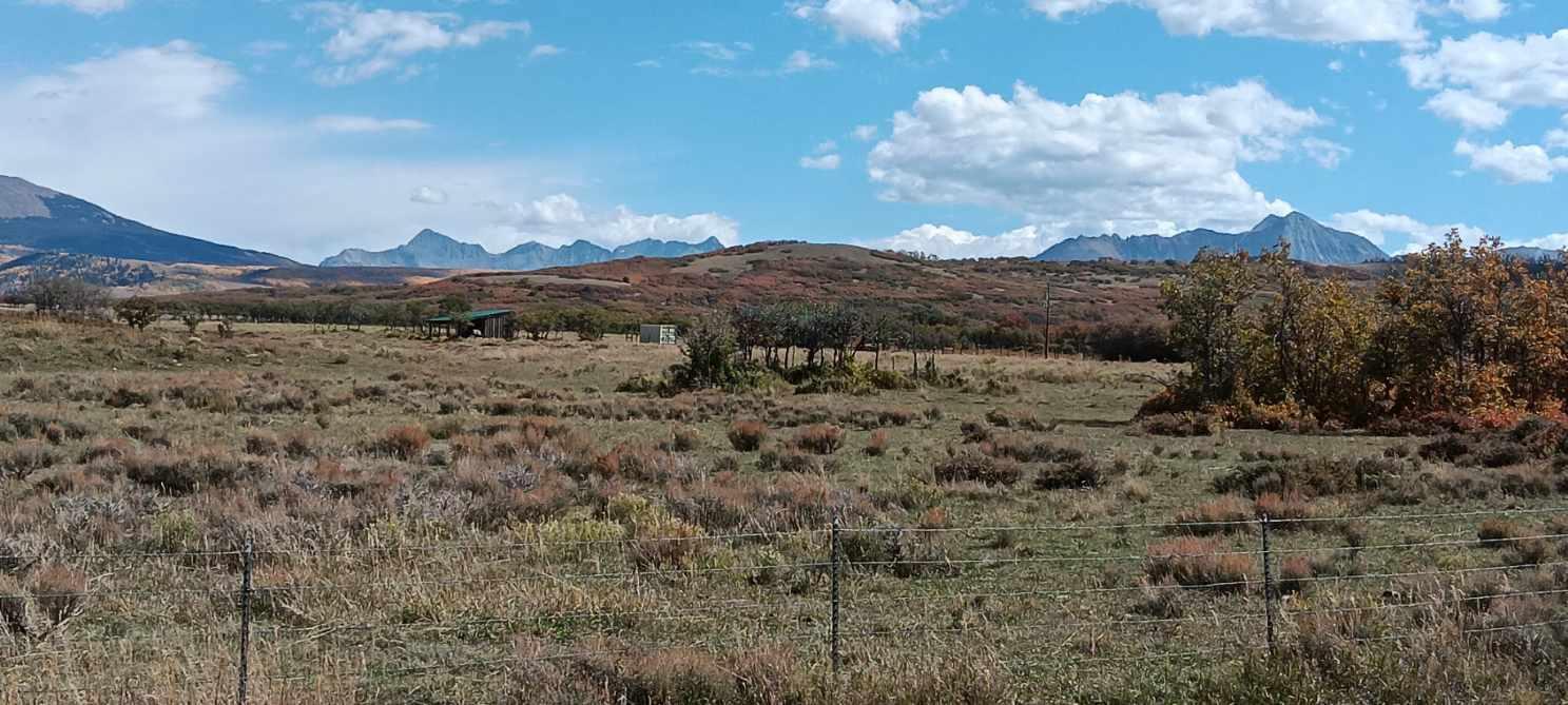 Tbd Beef Trail Road Norwood, CO 81423 - Photo 7 of 7 a view of a dry yard with mountains in the background