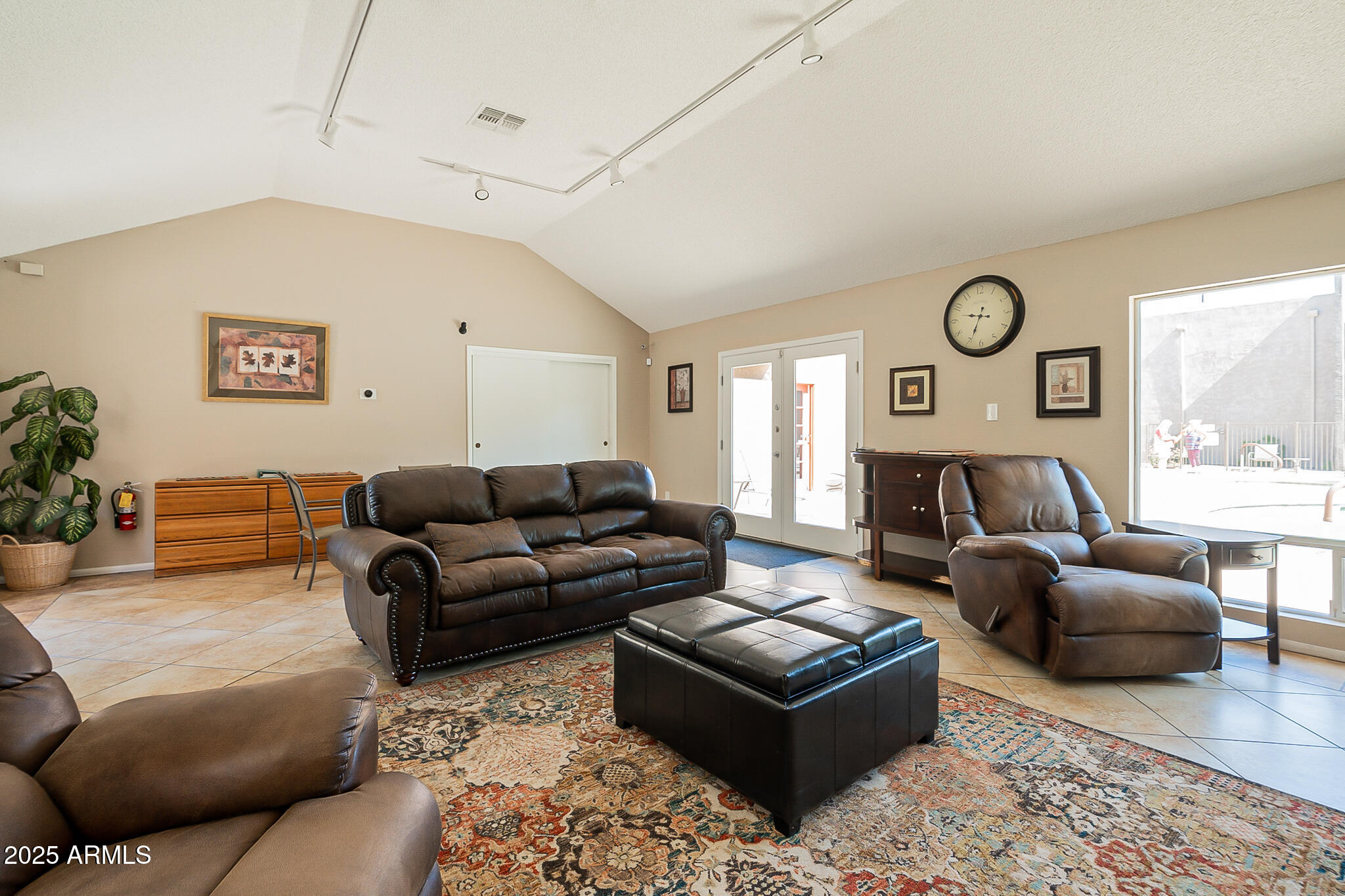 5525 East Thomas Road, Unit N5 Phoenix, AZ 85018 - Photo 19 of 27 a living room with furniture and a large window