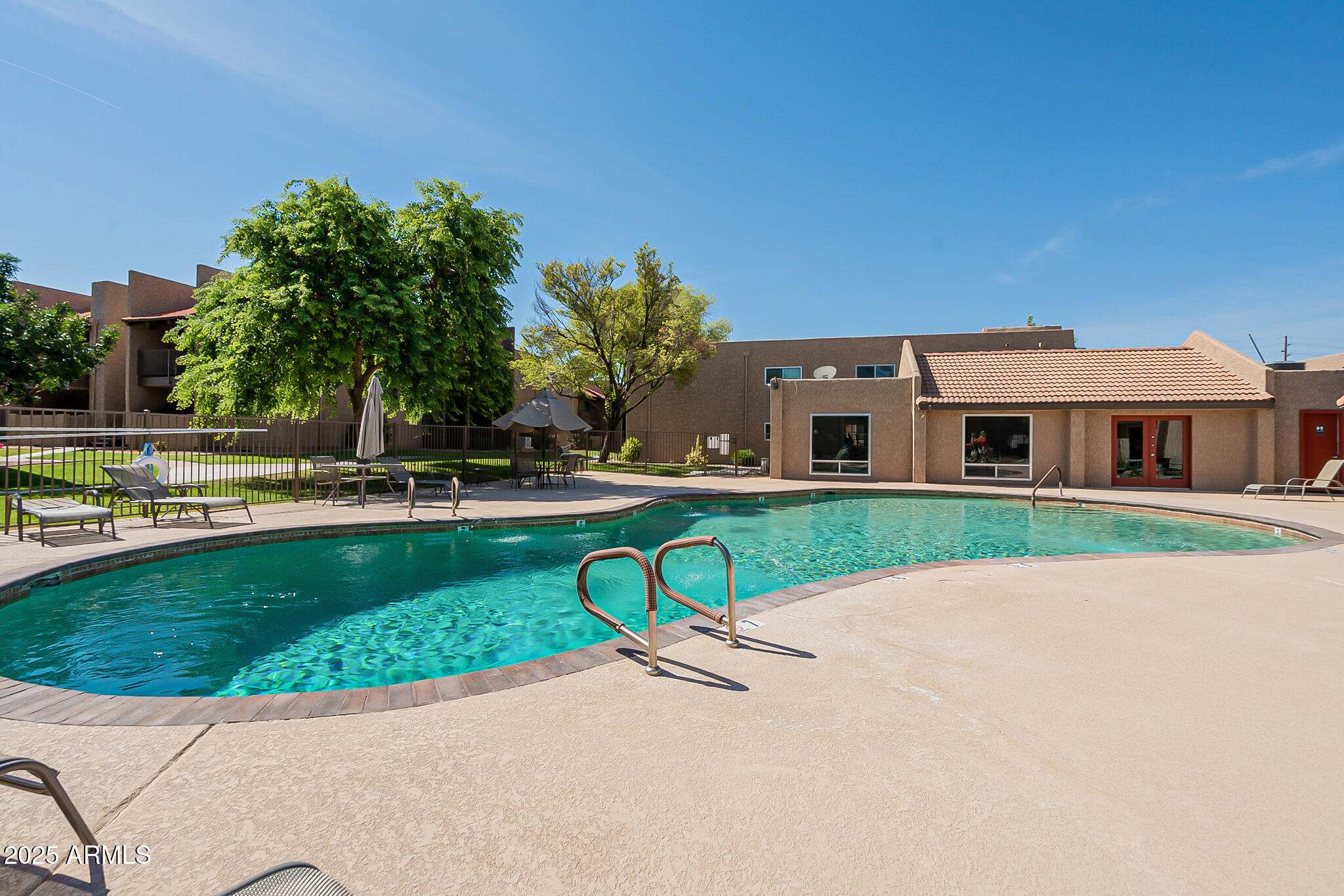 5525 East Thomas Road, Unit N5 Phoenix, AZ 85018 - Photo 24 of 27 a aerial view of a house with a yard