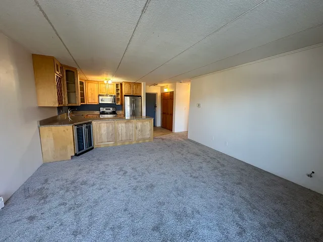 a view of a kitchen with a sink