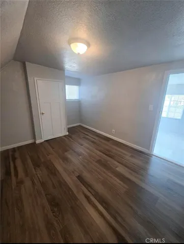 a bathroom with a toilet sink and shower