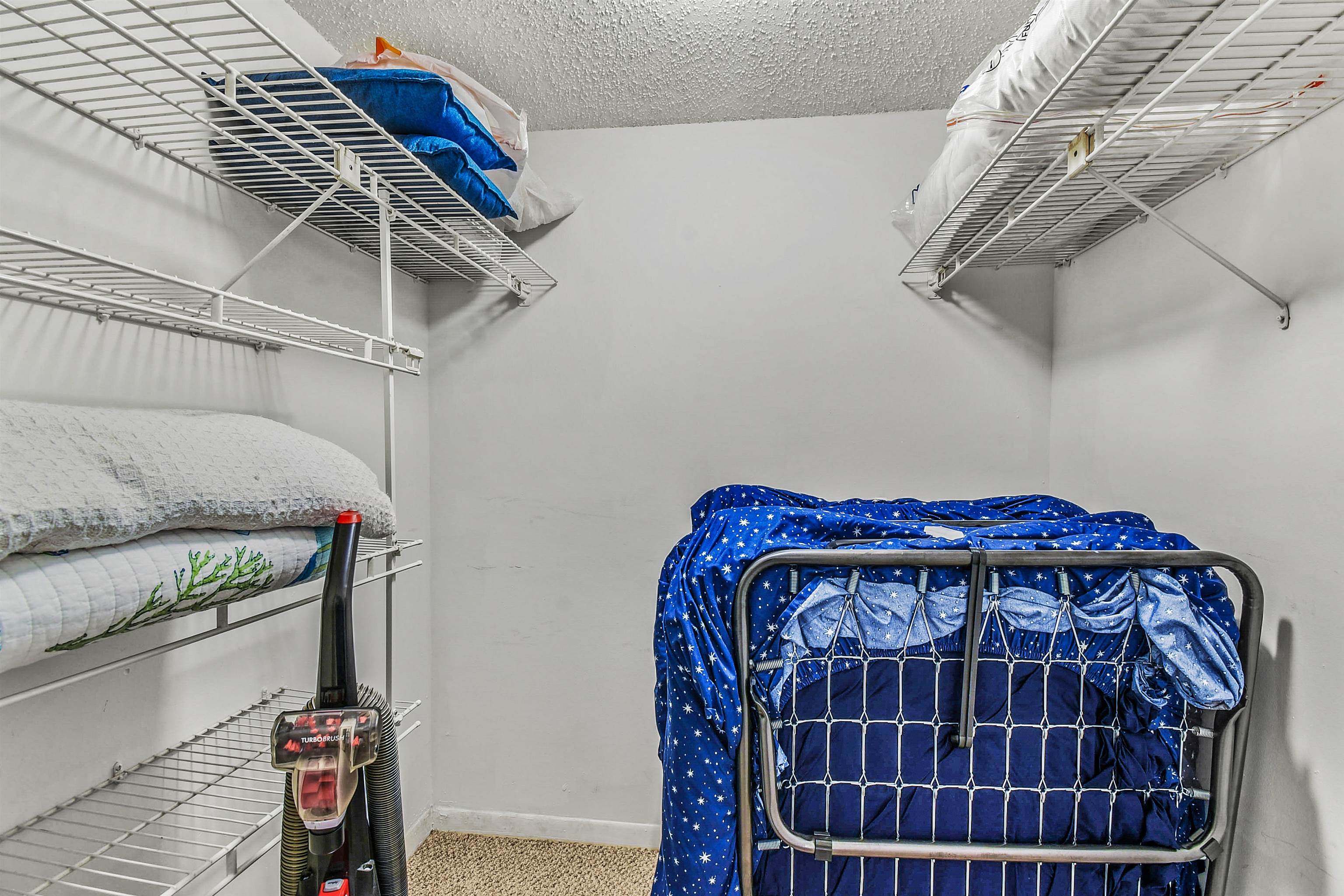 2 Dondanville Road, Unit 212 St. Augustine, FL 32080 - Photo 24 of 31 a view of a walk in closet