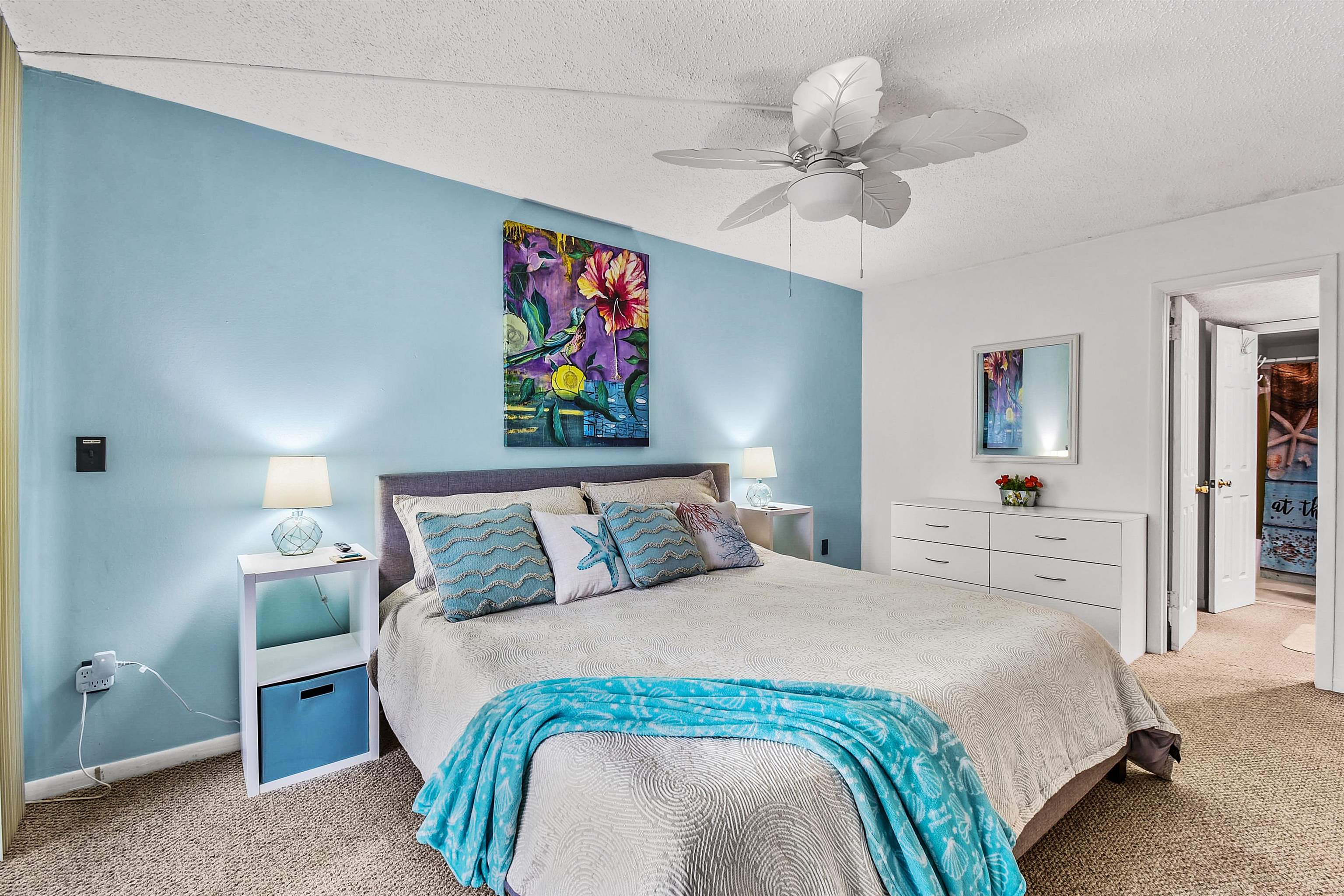 2 Dondanville Road, Unit 212 St. Augustine, FL 32080 - Photo 5 of 31 a bedroom with a bed and ceiling fan