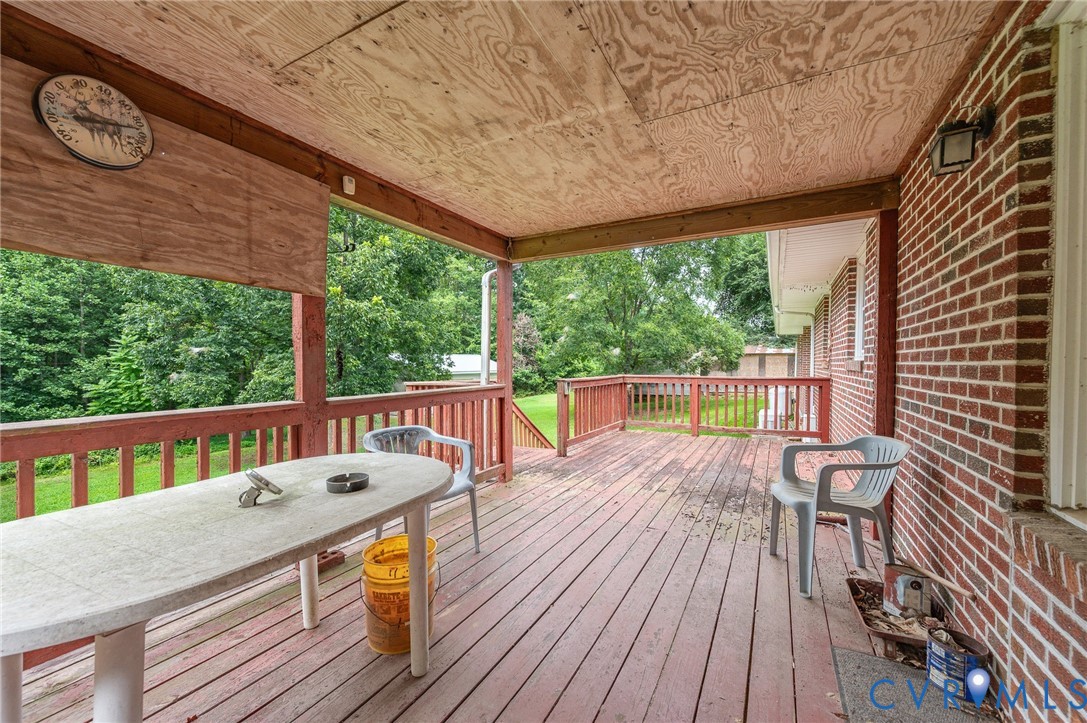 3612 Back Hampden Sydney Road Farmville, VA 23901 - Photo 13 of 17 Covered outdoor deck with wood flooring and red-st