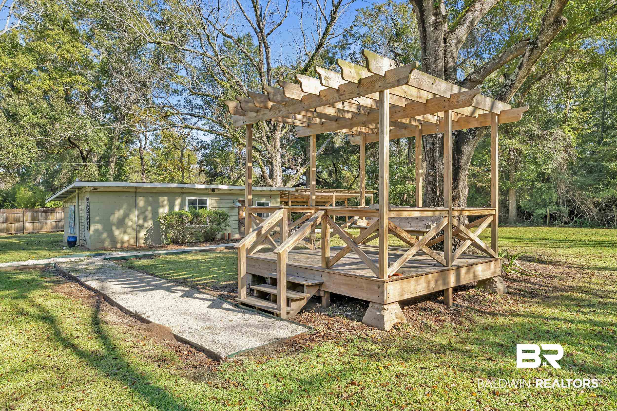 13232 Mary Ann Bch Road Fairhope, AL 36532 - Photo 54 of 79 Wooden deck featuring a yard