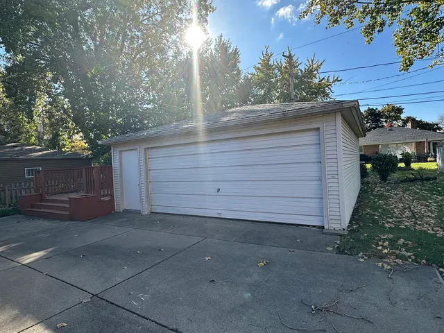 a view of a house and a yard