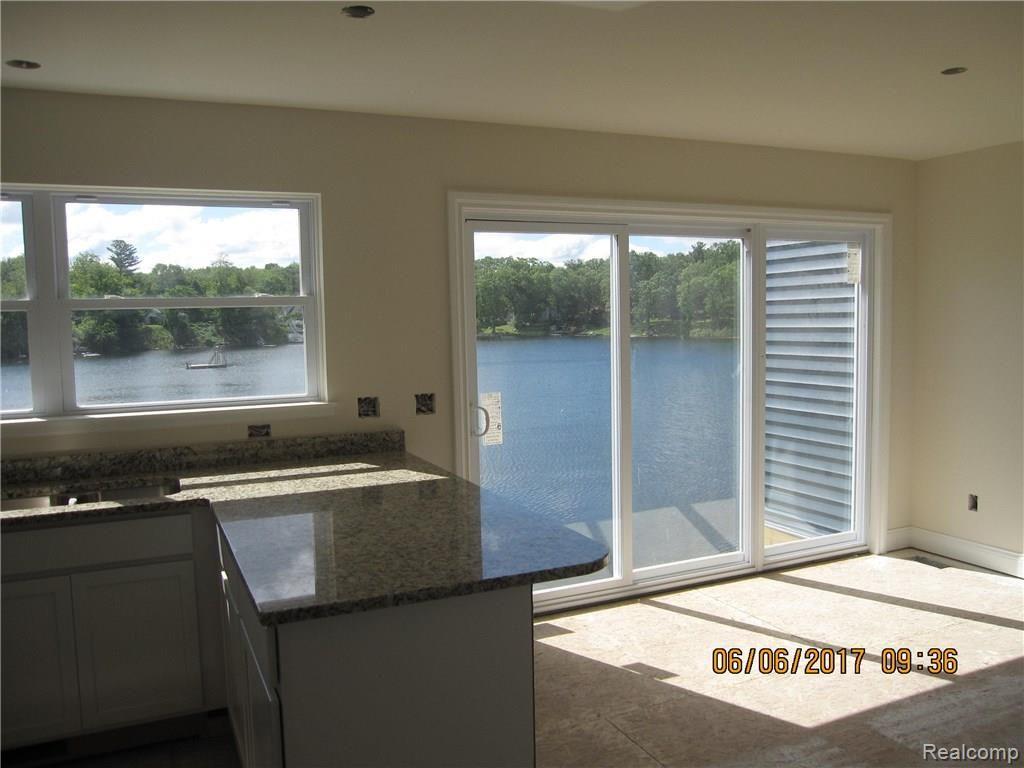 1456 Clark Lake Road Brighton, MI 48114 - Photo 5 of 17 Dining on the Lake