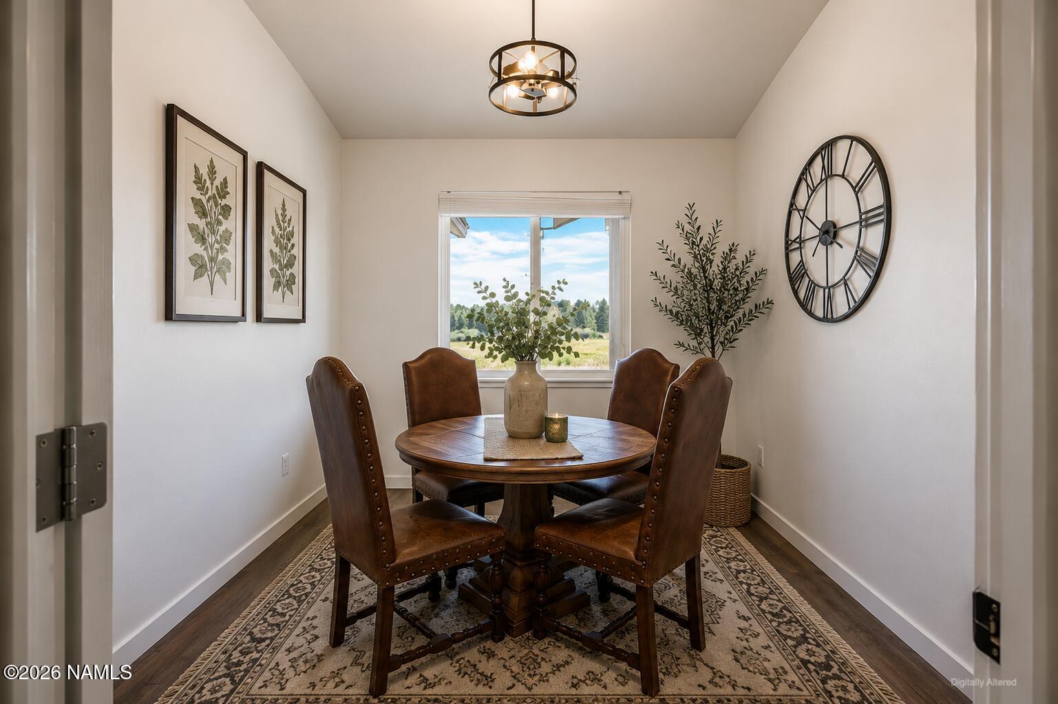 10272 Fw Mclure Road Flagstaff, AZ 86004 - Photo 5 of 38 a dining room with furniture and window