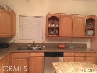 15542 Kiamichi Road Apple Valley, CA 92307 - Photo 13 of 39 a kitchen with a sink and cabinets