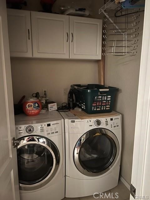15542 Kiamichi Road Apple Valley, CA 92307 - Photo 15 of 39 a utility room with dryer and washer