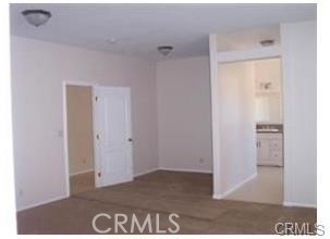 15542 Kiamichi Road Apple Valley, CA 92307 - Photo 23 of 39 a view of a bedroom