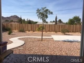 15542 Kiamichi Road Apple Valley, CA 92307 - Photo 32 of 39 a view of a backyard
