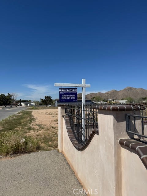 15542 Kiamichi Road Apple Valley, CA 92307 - Photo 6 of 39 a view of a terrace with a lake