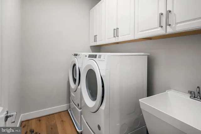 a utility room with dryer and washer