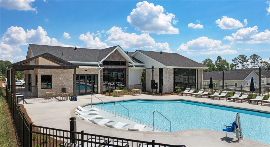 100 Rosemoore Drive Covington, GA 30014 - Photo 24 of 41 a view of a house with swimming pool and sitting area