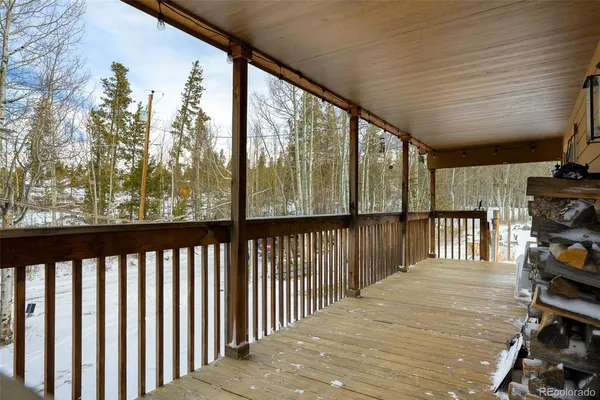 a view of a terrace with snow on the wall