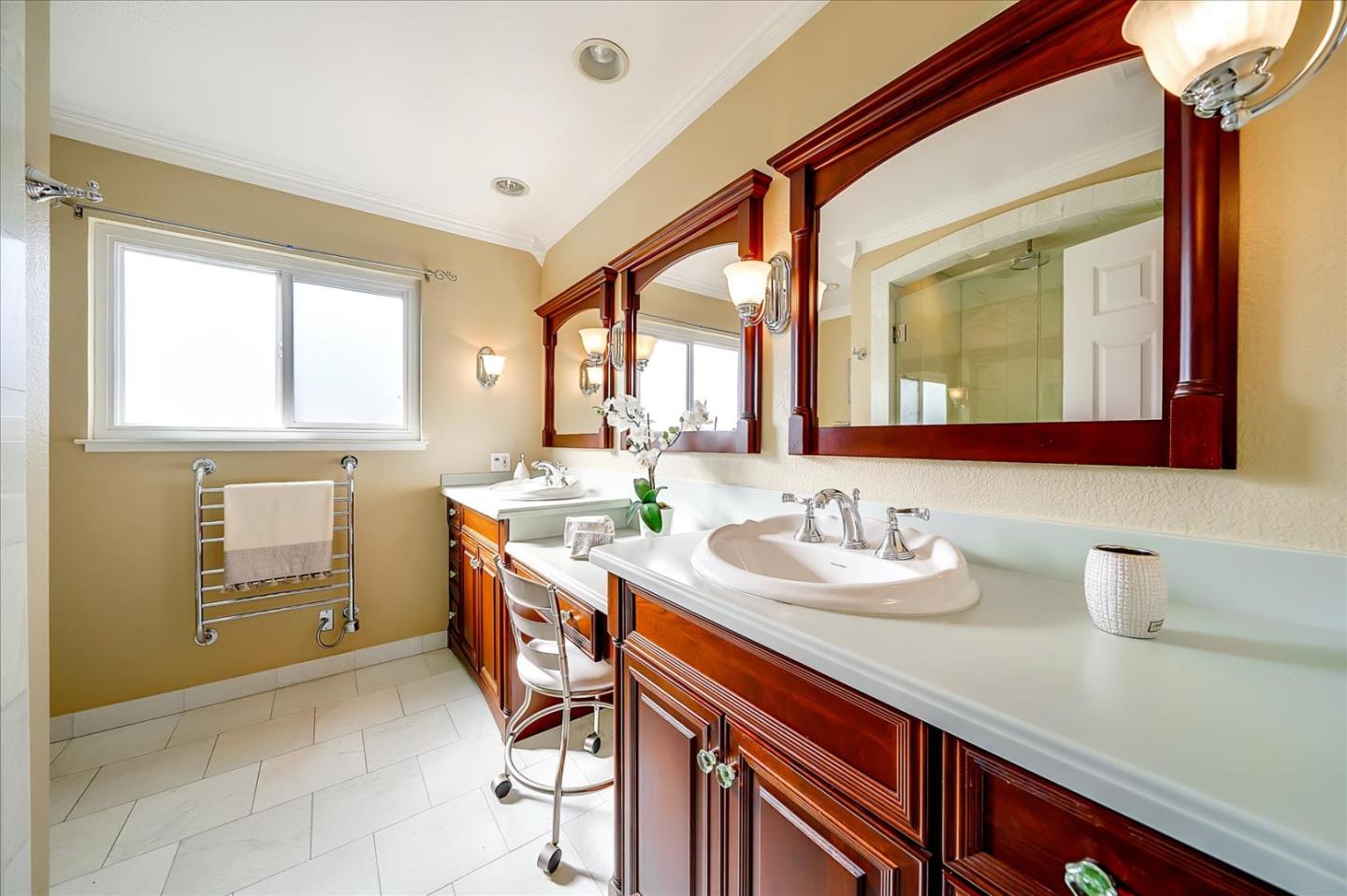 475 Winged Foot Road Half Moon Bay, CA 94019 - Photo 21 of 28 a bathroom with a sink a vanity and a mirror