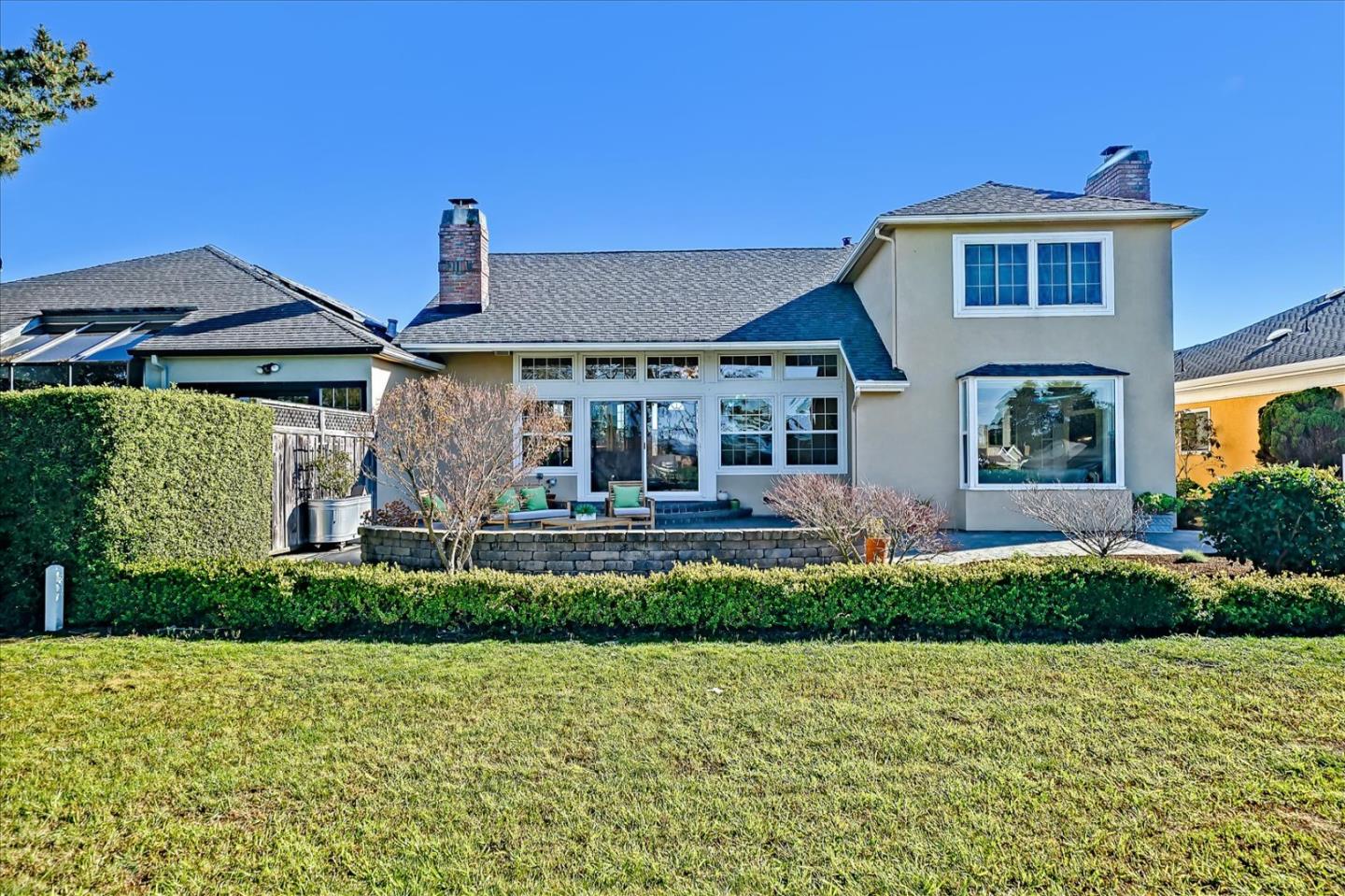 475 Winged Foot Road Half Moon Bay, CA 94019 - Photo 26 of 28 a front view of a house with a yard