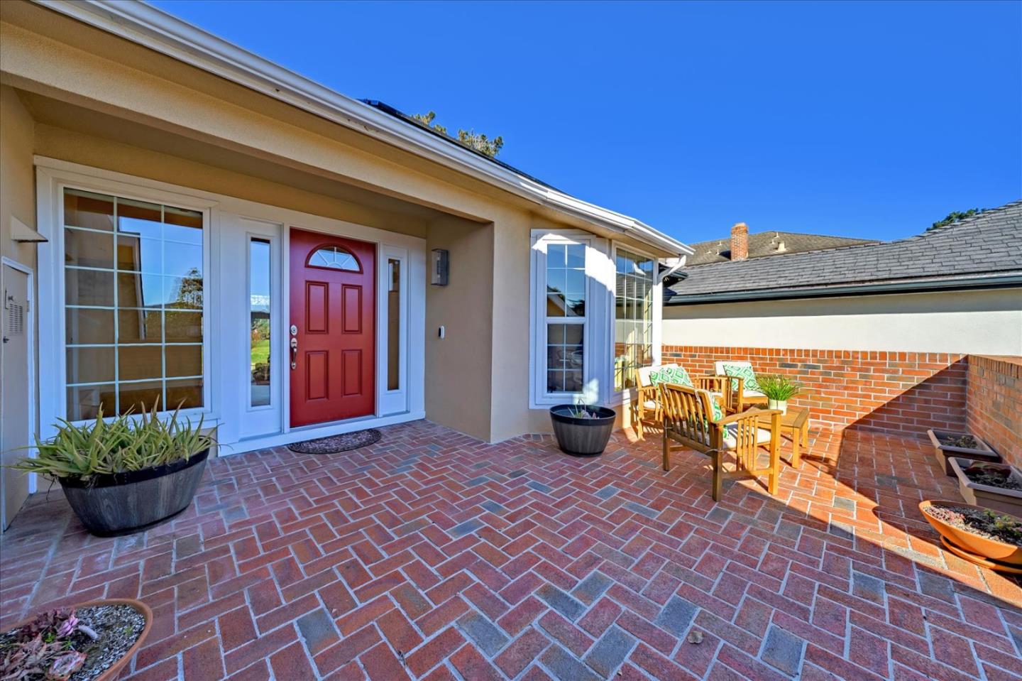 475 Winged Foot Road Half Moon Bay, CA 94019 - Photo 3 of 28 a front view of a house with a large window