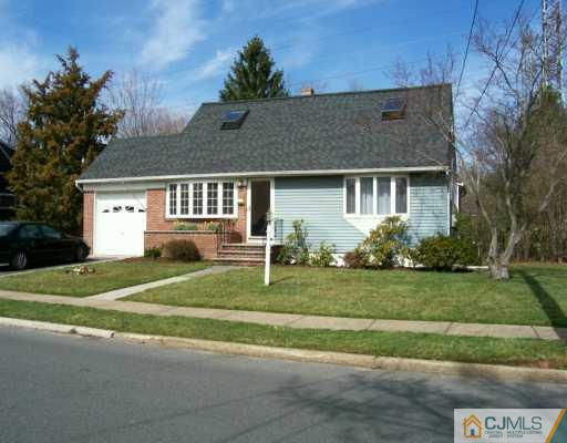 11 Montview Road Edison, NJ 08837 - Photo 1 of 8 a view of a house with a yard and a garden