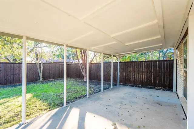 a view of a backyard with a garden