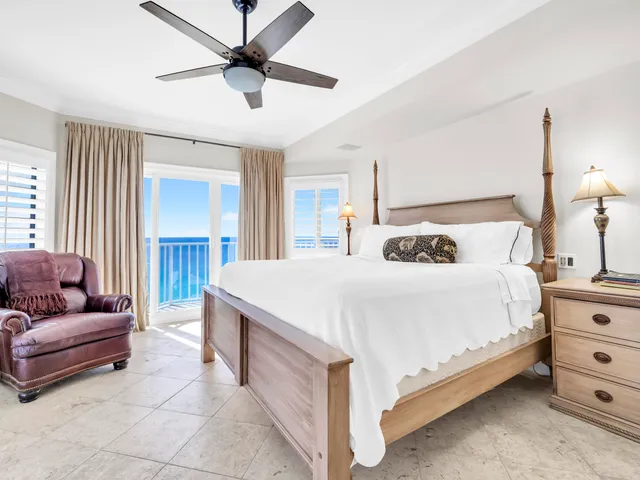 a spacious bathroom with a granite countertop sink a mirror and a